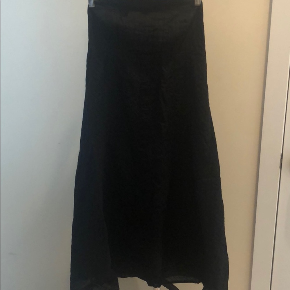 Black textured strapless dress.